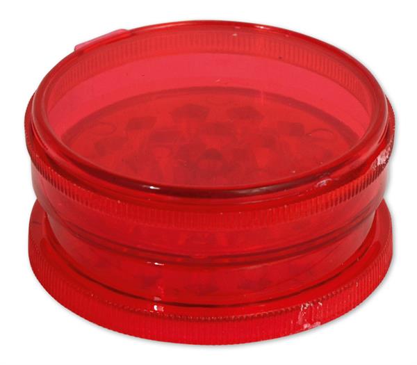 a red fire hydrant sitting next to a red barrel