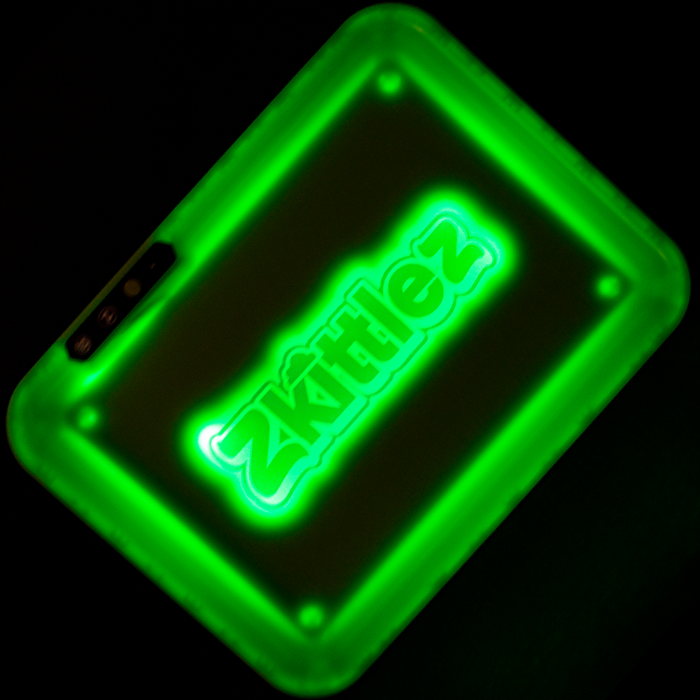 a close up of a green cell phone 